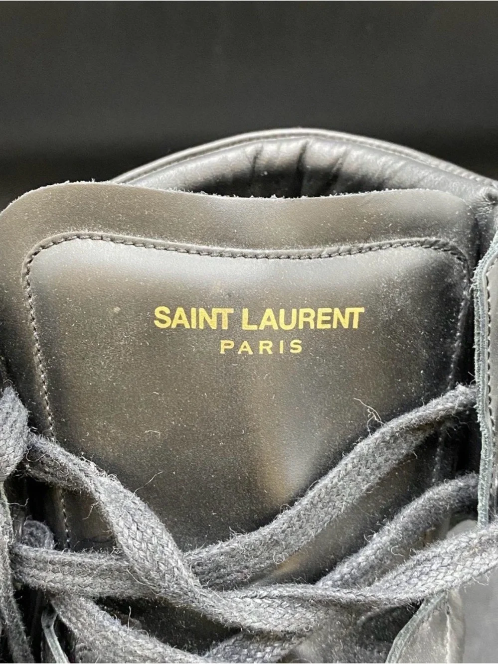 Saint Laurent Black Leather High-Top Sneakers with Gold Logo
